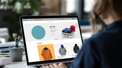 Header image for Branded Scrubs and Apparel as Tradeshow Giveaways: What Hospital Marketing Teams Need to Know (2026)