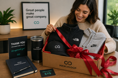 Premium employee appreciation gift set featuring branded Nike hoodie, North Face jacket, YETI-style tumbler, and merch credit card from an on-demand company swag store with no minimums