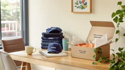 Header image for Same-Week Onboarding Swag vs. Bulk Pre-Kits: Which Model Wins When New Hires Start Remotely on Short Notice (2026)